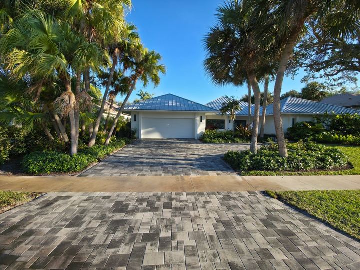 Restored concrete paver driveway in Palm Beach